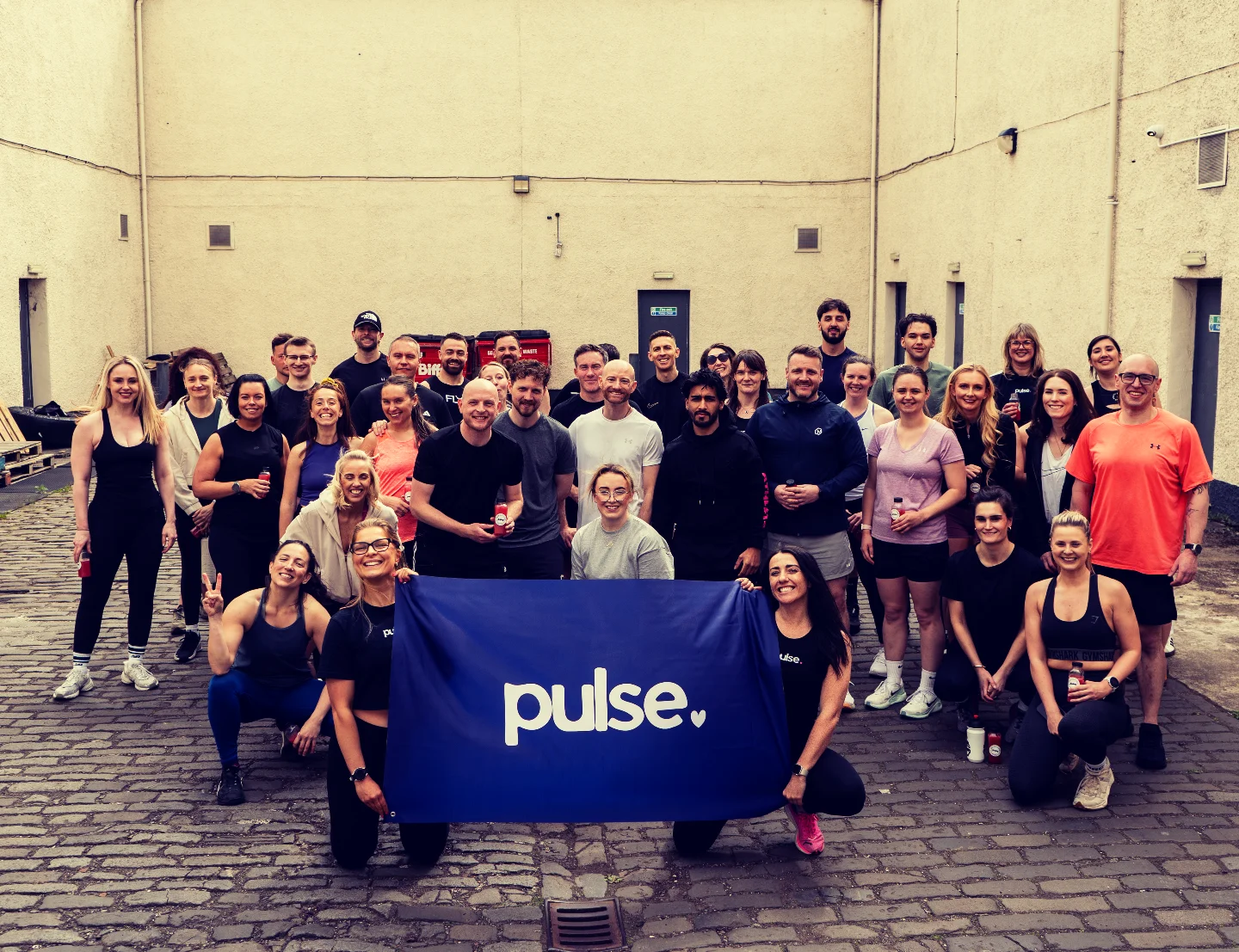 The Pulse community together after a group run