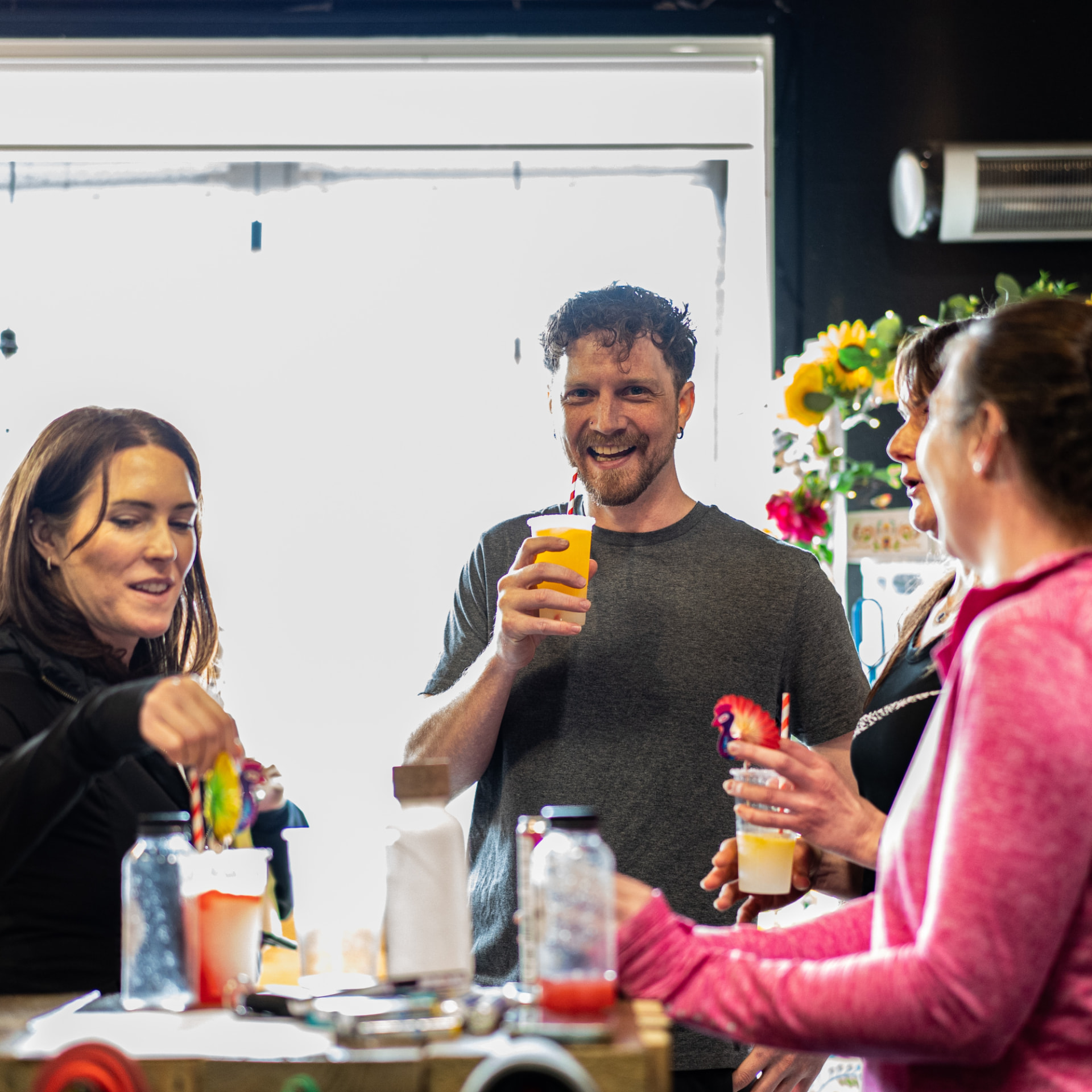 Guests chatting over drinks at a Pulse social